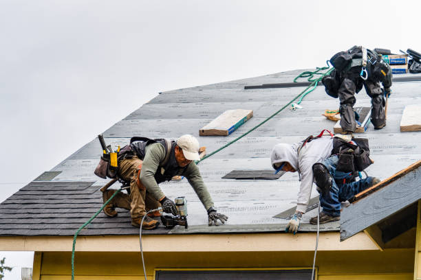 Professional Gutter Installation technician working in Oberlin, KS